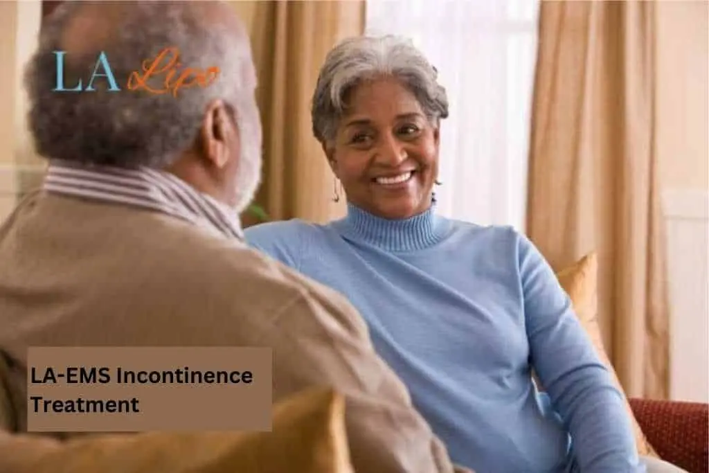 Couple sat smiling at each other - LA-EMS treatment Crystal Palace